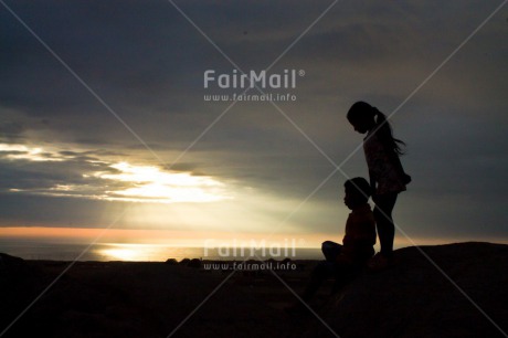 Fair Trade Photo Beach, Brother, Colour image, Colourful, Evening, Horizontal, Light, Outdoor, People, Peru, Sea, Shooting style, Silhouette, Sister, Sky, South America, Sun, Sunset, Two children, Two persons