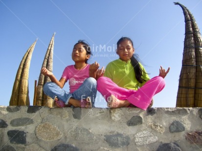 Fair Trade Photo 5 -10 years, Activity, Casual clothing, Clothing, Colour image, Day, Green, Horizontal, Latin, Outdoor, People, Peru, Pink, Sky, South America, Two girls, Yoga