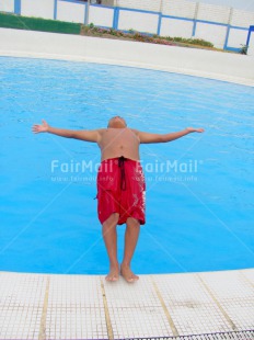 Fair Trade Photo Activity, Blue, Jumping, One boy, Outdoor, People, Peru, Playing, Red, South America, Summer, Swimming, Vertical, Water