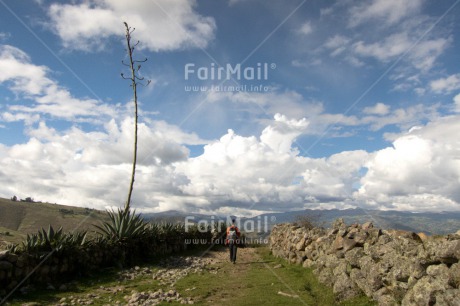 Fair Trade Photo Activity, Clouds, Day, Horizontal, One boy, Outdoor, People, Peru, Rural, Sky, South America, Stone, Travel, Walking, Wide shot