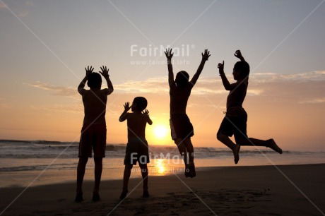 Fair Trade Photo 5 -10 years, Activity, Beach, Colour image, Emotions, Evening, Friendship, Group of boys, Happiness, Horizontal, Jumping, Latin, Outdoor, People, Peru, Playing, Sea, Silhouette, South America, Sunset, Together