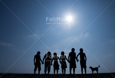 Fair Trade Photo Activity, Backlit, Beach, Colour image, Cooperation, Emotions, Evening, Freedom, Friendship, Group of boys, Happiness, Holding hands, Outdoor, People, Peru, Playing, Silhouette, Sky, South America, Sunset, Together