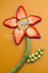Fair Trade Photo Closeup, Colour image, Flower, Food and alimentation, Fruits, Funny, Peru, Smile, South America, Strawberry, Studio
