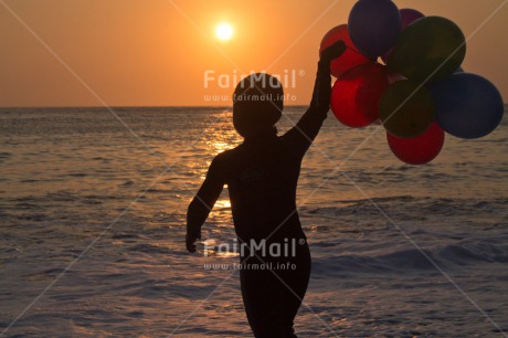 Fair Trade Photo 5 -10 years, Activity, Balloon, Beach, Emotions, Evening, Happiness, Horizontal, One boy, Outdoor, People, Peru, Playing, South America, Sunset