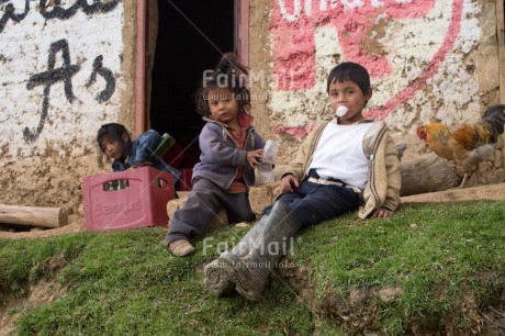 Fair Trade Photo Activity, Alcoholism, Brother, Colour image, Drinking, Family, Group of children, Health, Horizontal, House, Latin, Looking at camera, People, Peru, Rural, Sister, Sitting, Social issues, South America, Young