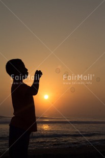 Fair Trade Photo Activity, Colour image, Dreaming, Evening, One boy, Outdoor, People, Peru, Playing, Soapbubble, South America, Spirituality, Sunset, Vertical