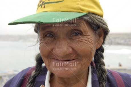 Fair Trade Photo Activity, Clothing, Colour image, Face, Hat, Horizontal, Looking at camera, Multi-coloured, Old age, One woman, Outdoor, People, Peru, Portrait headshot, Smile, Smiling, South America, Wisdom