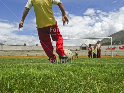 Fair Trade Photo Activity, Ball, Colour image, Day, Grass, Green, Group of children, Horizontal, Kicking, Outdoor, People, Peru, Playing, Red, Rural, Seasons, Soccer, South America, Sport, Summer