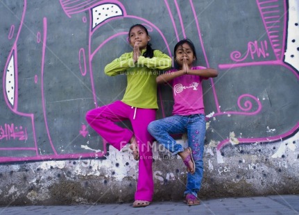 Fair Trade Photo 10-15 years, Activity, Casual clothing, Clothing, Colour image, Day, Green, Horizontal, Latin, Outdoor, People, Peru, Pink, South America, Two girls, Yoga
