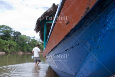 Fair Trade Photo Activity, Boat, Cleaning, Day, Focus on foreground, Horizontal, One man, Outdoor, People, Peru, River, Rural, South America, Transport, Water