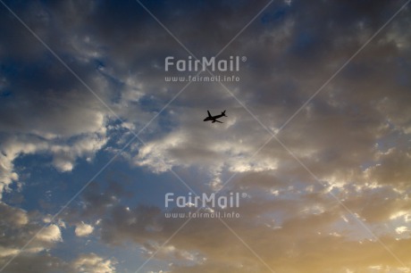Fair Trade Photo Airplane, Clouds, Evening, Horizontal, Low angle view, Outdoor, Peru, Sky, South America, Travel, Wide shot