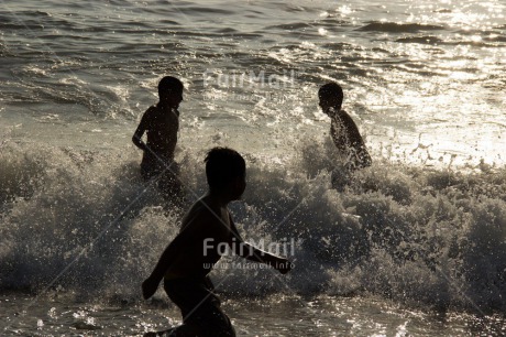 Fair Trade Photo Activity, Colour image, Emotions, Evening, Freedom, Friendship, Fun, Group of boys, Happiness, Outdoor, People, Peru, Playing, Sea, South America, Sport, Together, Water