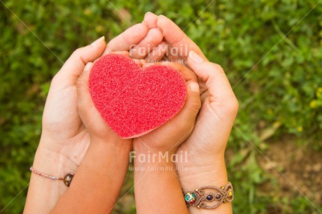 Fair Trade Photo Child, Colour image, Day, Girl, Grass, Green, Hands, Heart, Horizontal, Love, Mothers day, Nature, Outdoor, People, Peru, Red, South America, Valentines day
