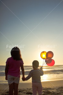 Fair Trade Photo Activity, Balloon, Beach, Brother, Colour image, Colourful, Evening, Family, Friend, Friendship, Hand, Holding, Holding hands, Light, Looking, Looking away, People, Peru, Sea, Shooting style, Silhouette, Sister, Sky, South America, Standing, Sun, Sunset, Two, Two people, Two persons, Vertical