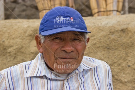 Fair Trade Photo Activity, Beach, Cap, Casual clothing, Clothing, Colour image, Day, Horizontal, Latin, Looking at camera, One man, Outdoor, People, Peru, Portrait headshot, Smiling, South America
