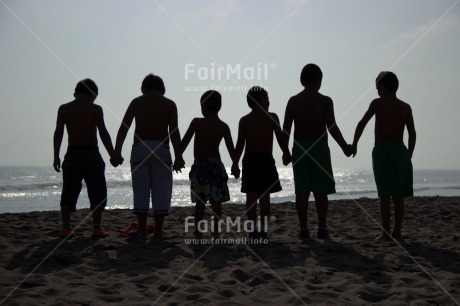 Fair Trade Photo Activity, Backlit, Beach, Colour image, Cooperation, Evening, Friendship, Holding hands, Outdoor, Peru, Sand, Silhouette, South America, Summer, Together