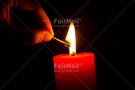 Fair Trade Photo Candle, Christmas, Closeup, Colour image, Condolence-Sympathy, Flame, Hand, Horizontal, Match, Peru, Red, Shooting style, South America