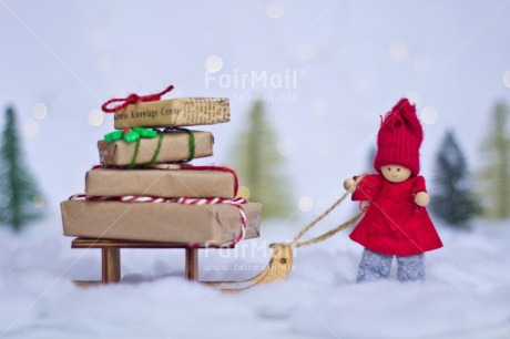 Fair Trade Photo Activity, Adjective, Celebrating, Christmas, Christmas decoration, Christmas tree, Colour, Doll, Gift, Horizontal, Light, Nature, Object, Present, Red, Sled, Snow