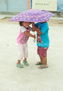 Fair Trade Photo Activity, Colour image, Day, Emotions, Friendship, Happiness, Outdoor, People, Peru, Playing, Smiling, South America, Together, Two children, Vertical