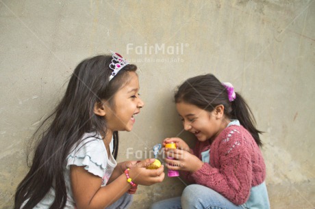 Fair Trade Photo Activity, Colour image, Emotions, Friendship, Happiness, Horizontal, People, Peru, Playing, Smiling, Soapbubble, South America, Two girls, Water