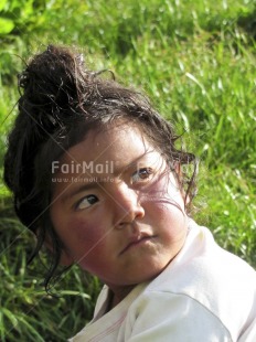 Fair Trade Photo 5 -10 years, Activity, Colour image, Day, Grass, Latin, Light, Looking away, Nature, One child, One girl, Outdoor, People, Peru, Portrait headshot, Rural, South America, Vertical