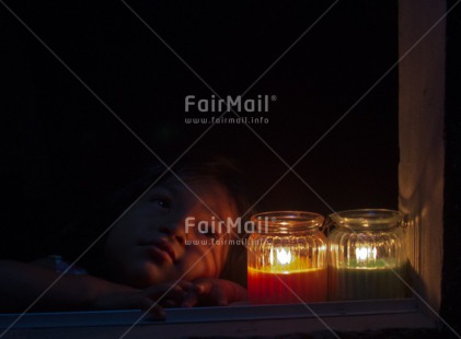 Fair Trade Photo 5 -10 years, Candle, Christmas, Colour image, Dreaming, Evening, Flame, Horizontal, House, Latin, One girl, People, Peru, South America