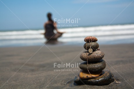 Fair Trade Photo Balance, Beach, Colour image, Horizontal, Meditation, Ohm, One girl, Outdoor, People, Peru, South America, Spirituality, Stone, Wellness, Yoga