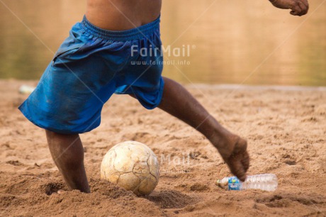 Fair Trade Photo Activity, Ball, Colour image, Day, Health, Horizontal, One boy, Outdoor, People, Peru, Playing, River, Soccer, South America, Sport