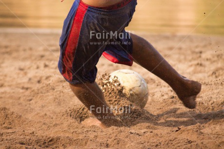 Fair Trade Photo Activity, Ball, Colour image, Day, Health, Horizontal, One boy, Outdoor, People, Peru, Playing, River, Soccer, South America, Sport