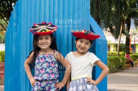 Fair Trade Photo Activity, Clothing, Colour image, Ethnic-folklore, Friendship, Hat, Horizontal, Looking at camera, People, Peru, Portrait halfbody, Smiling, South America, Traditional clothing, Two girls