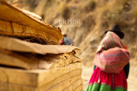 Fair Trade Photo Activity, Clothing, Colour image, Culture, Day, Horizontal, Latin, Mountain, Outdoor, People, Peru, South America, Traditional clothing, Walking, Woman, Wood