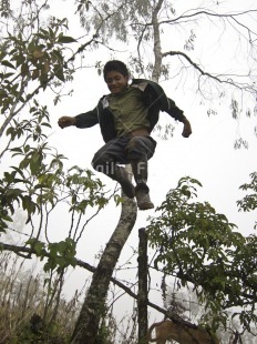 Fair Trade Photo Activity, Colour image, Emotions, Happiness, Jumping, One boy, Outdoor, People, Peru, Portrait fullbody, Rural, South America, Vertical