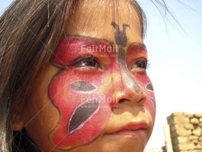 Fair Trade Photo 5-10 years, Activity, Butterfly, Colour image, Day, Decoration, Ethnic-folklore, Horizontal, Looking away, One child, One girl, Outdoor, People, Peru, Portrait headshot, Smiling, South America