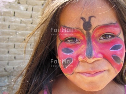 Fair Trade Photo 5-10 years, Activity, Butterfly, Colour image, Day, Decoration, Ethnic-folklore, Horizontal, Looking at camera, One child, One girl, Outdoor, People, Peru, Portrait headshot, Smiling, South America