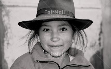 Fair Trade Photo 10-15 years, Activity, Black and white, Casual clothing, Clothing, Day, Girl, Hat, Horizontal, Latin, Looking at camera, One child, One girl, Outdoor, People, Peru, Pink, Portrait headshot, Rural, Smiling, South America, Thinking of you