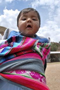 Fair Trade Photo 0-5 years, Activity, Baby, Colour image, Funny, Latin, Looking at camera, Low angle view, One boy, One child, People, Peru, Portrait headshot, South America, Vertical