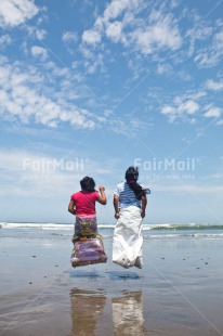 Fair Trade Photo Activity, Beach, Child, Colour image, Emotions, Felicidad sencilla, Friend, Friendship, Girl, Happiness, Happy, Holiday, New beginning, People, Peru, Play, Playing, Sea, Sister, South America, Vertical