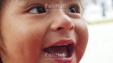 Fair Trade Photo 0-5 years, Activity, Closeup, Horizontal, Latin, Looking away, One girl, People, Portrait headshot, Smiling