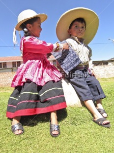 Fair Trade Photo Clothing, Colour image, Cute, Dress, Ethnic-folklore, Friendship, Love, Multi-coloured, Outdoor, People, Peru, Portrait fullbody, Rural, Sandals, Sombrero, South America, Together, Traditional clothing, Two children, Vertical