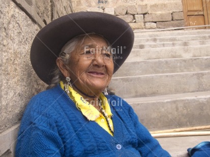 Fair Trade Photo Activity, Blue, Casual clothing, Clothing, Colour image, Dailylife, Ethnic-folklore, Hat, Horizontal, Looking away, Multi-coloured, One woman, Outdoor, People, Peru, Portrait halfbody, Smiling, Sombrero, South America, Streetlife