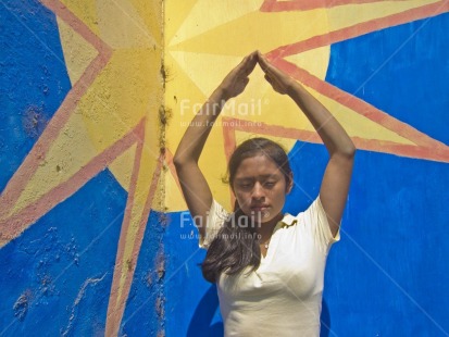 Fair Trade Photo 15-20 years, Activity, Casual clothing, Clothing, Colour image, Day, Horizontal, Latin, Meditating, One girl, Outdoor, People, Peru, South America, Star, Street, Streetlife, Wellness, Yoga