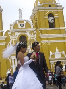 Fair Trade Photo Activity, Bride, Christianity, Church, Clothing, Colour image, Day, Flower, Groom, Looking away, Love, Marriage, Outdoor, People, Peru, Portrait fullbody, Religion, South America, Standing, Traditional clothing, Vertical, Walking