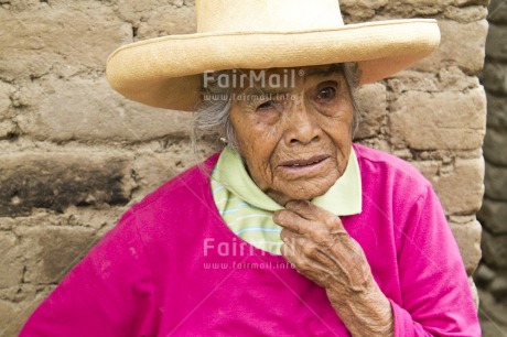 Fair Trade Photo Activity, Casual clothing, Clothing, Colour image, Day, Hat, Horizontal, Latin, Looking at camera, Old age, One woman, Outdoor, People, Peru, Pink, Portrait headshot, Rural, South America, Street, Streetlife