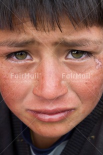 Fair Trade Photo 5 -10 years, Closeup, Colour image, Day, Emotions, Latin, One boy, Outdoor, People, Peru, Portrait headshot, Sadness, South America, Vertical